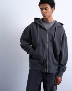 Model wearing Heavyweight oversized zip through hoodie in charcoal