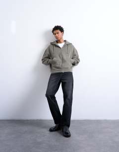 Model wearing Heavyweight oversized zip through hoodie in olive