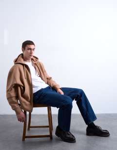 Model wearing Heavyweight oversized zip through hoodie in stone