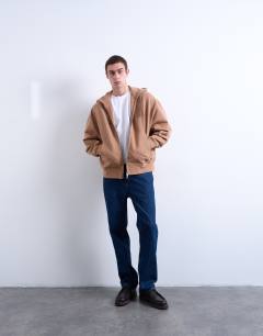 Model wearing Heavyweight oversized zip through hoodie in stone