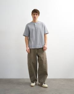 Model wearing Heavyweight relaxed fit henley t-shirt in grey