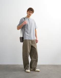 Model wearing Heavyweight relaxed fit henley t-shirt in grey