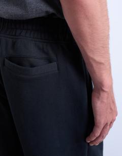 Model wearing Heavyweight straight leg jogger in black