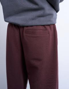 Model wearing Heavyweight straight leg jogger in brown