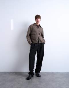 Model wearing Herringbone short jacket in brown