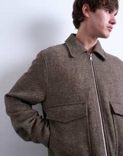 Model wearing Herringbone short jacket in brown