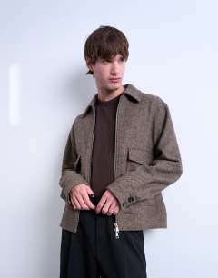 Model wearing Herringbone short jacket in brown