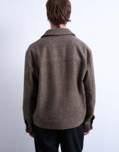 Model wearing Herringbone short jacket in brown