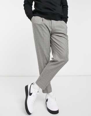 black and white tapered trousers