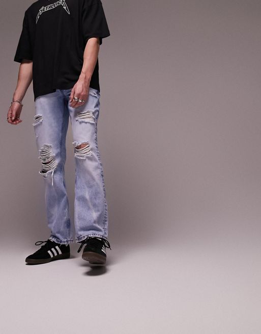 Topman – Jasnoniebieskie jeansy o luźnym kroju z rozdarciami 