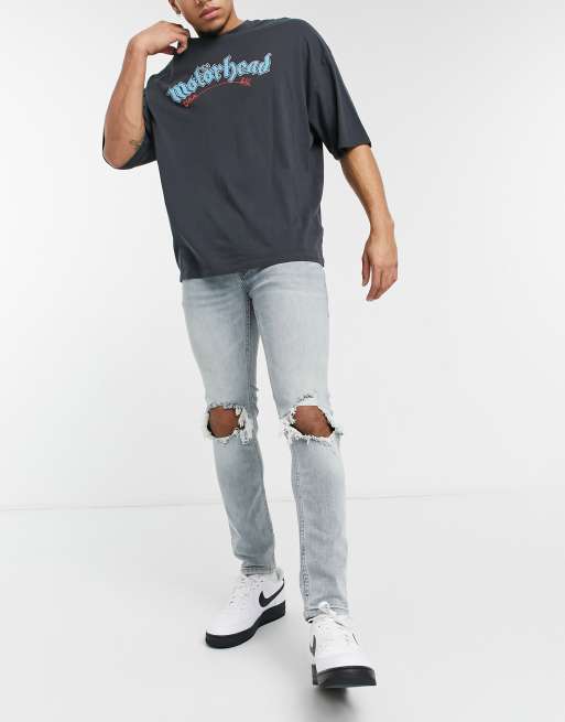 Topman – Jasnoniebieskie obcisłe jeansy z dużymi rozdarciami z na kolanach