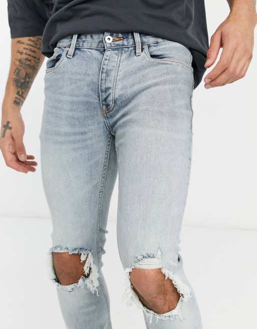 Topman – Jasnoniebieskie obcisłe jeansy z dużymi rozdarciami z na kolanach, 3 z 4