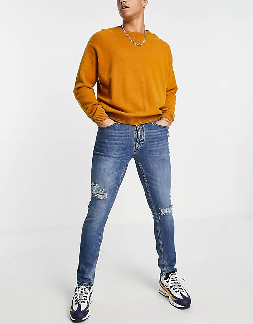 Jeans skinny lavaggio medio tinto con strappi vistosiASOS in Denim da Uomo colore Blu Uomo Abbigliamento da Jeans da Jeans skinny 
