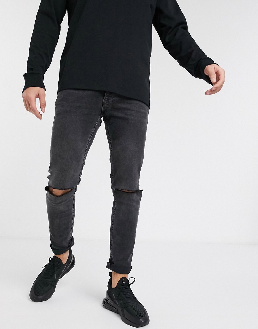 Topman - Jeans skinny nero slavato con strappi sulle ginocchia