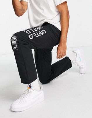 Pantalons et chinos Topman - Jogger décontracté en nylon - Noir