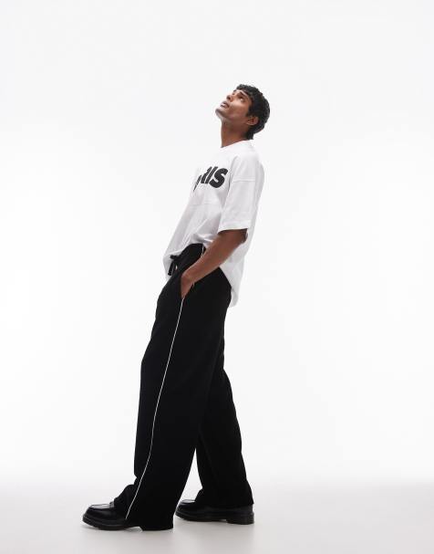Topman - Joggers larghi neri in velour con fettuccia laterale - view 1