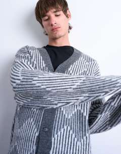 Model wearing Knitted diamond cardigan in grey