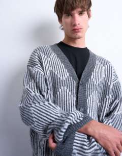 Model wearing Knitted diamond cardigan in grey