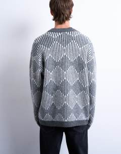 Model wearing Knitted diamond cardigan in grey