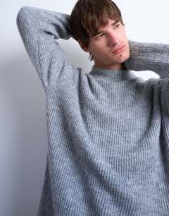 Model wearing Knitted jumper in grey
