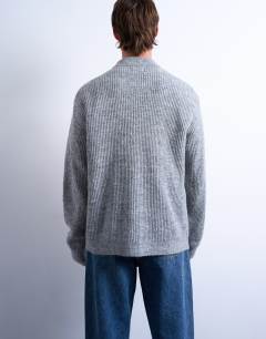 Model wearing Knitted jumper in grey