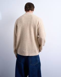 Model wearing Knitted jumper in stone