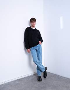 Model wearing Knitted smart polo jumper in black