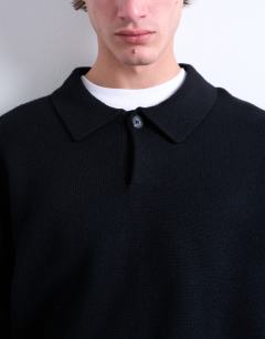 Model wearing Knitted smart polo jumper in black