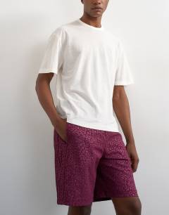 Model wearing Leopard jacquard short in burgundy