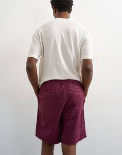 Model wearing Leopard jacquard short in burgundy