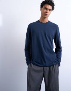 Model wearing Lightweight long sleeve tee in navy