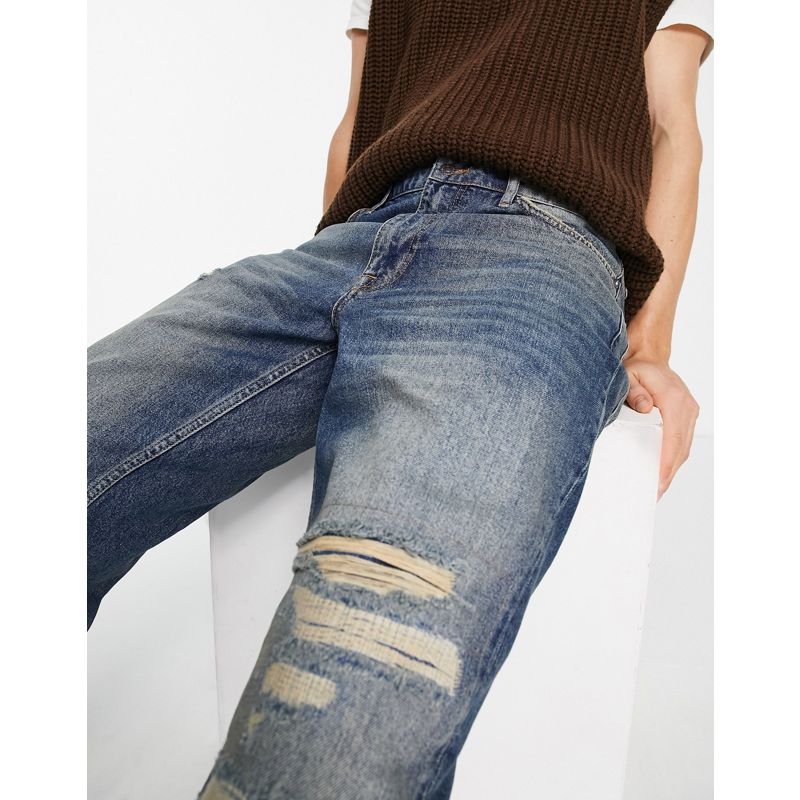 Topman – Lockere Jeans mit Rissen und Flicken in mittlerer Waschung mit Grünstich 