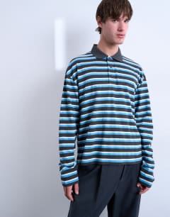 Model wearing Long sleeve cropped rugby polo in blue