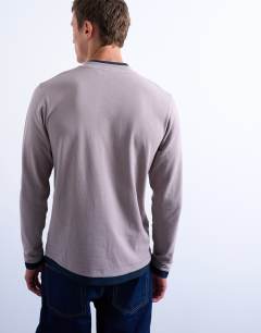Model wearing Long sleeve doubled layered tee in lilac and navy