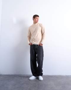 Model wearing Long sleeve doubled layered tee in stone and ecru