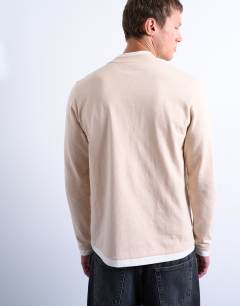 Model wearing Long sleeve doubled layered tee in stone and ecru