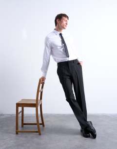Model wearing Long sleeve formal slim sateen shirt in white