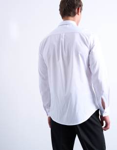 Model wearing Long sleeve formal slim sateen shirt in white