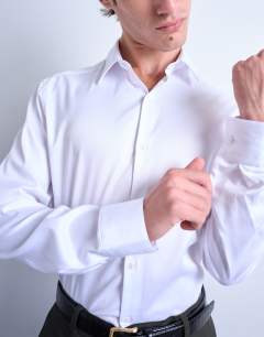 Model wearing Long sleeve formal slim shirt in white
