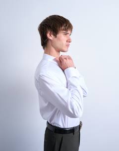 Model wearing Long sleeve formal slim shirt in white