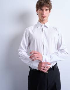 Model wearing Long sleeve formal stretch shirt in white