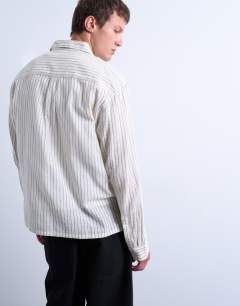 Model wearing Long sleeve relaxed cheesecloth stripe in cream