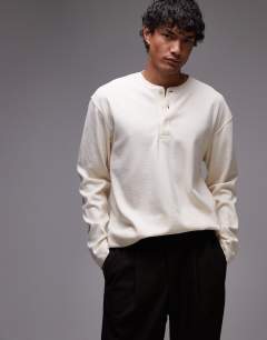 Model wearing Long sleeve relaxed fit waffle t-shirt with henley in ecru