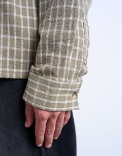 Model wearing Long sleeve relaxed grid check shirt in khaki