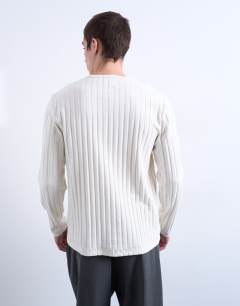 Model wearing Long sleeve rib henley tee in cream