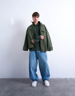 Model wearing Long sleeve textured polo in dark green