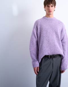 Model wearing Loose knit crew jumper in purple