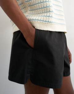 Model wearing Micro fit short in black