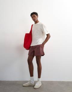 Model wearing Micro fit stripe short in brown