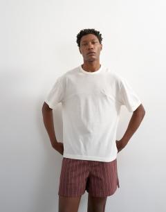 Model wearing Micro fit stripe short in brown